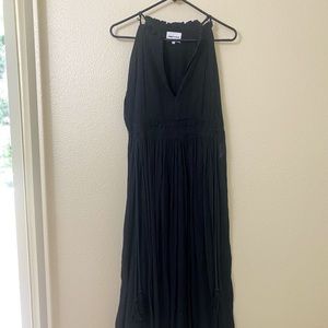 This is a size S-M black dress from Bimba y Lola. Ideal for summer.